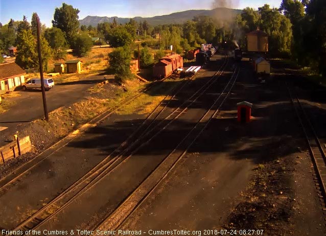 2018-07-24 As the dance continues, the 463 has moved back to the tank to wash the new added coal as 489 waits just outside the yard.jpg