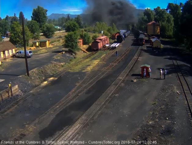 2018-07-24 The parlor is passing the tank as the locomotives leave the yard.jpg