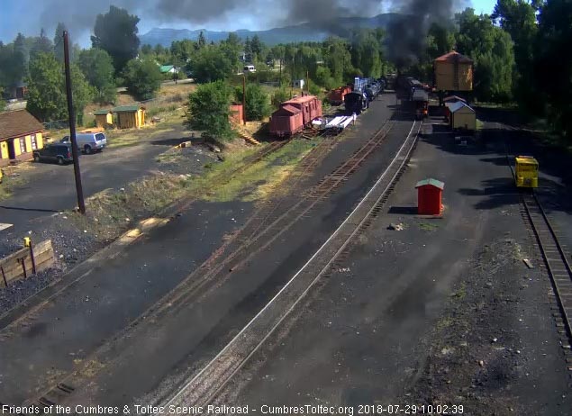 2018-07-29 The parlor New Mexico is passing the tank as the locomotive exits the yard.jpg