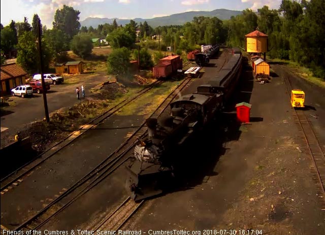 2018-07-30 The 487 comes up to the tipple as 2 Friends wave from the bank to the left.jpg