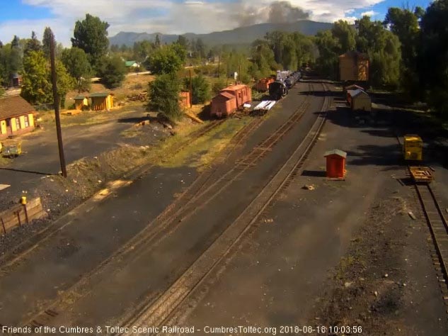 2018-08-18 The last cars are rounding the curve as the train heads east.jpg