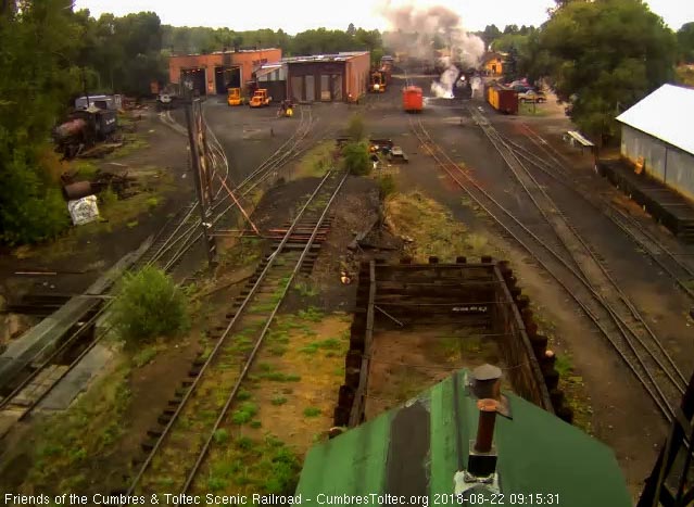 2018-08-22 With the cool, damp air, the steam is condensing around the 487 which has mved the train forward into loading position.jpg