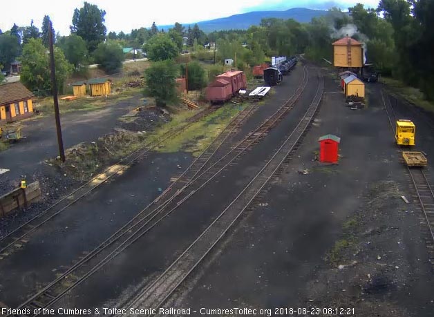 2018-08-22 The 489 is now at the tank as a hostler lowers the spout to fill the tender.jpg