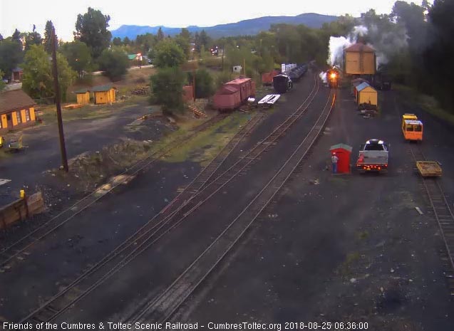 2018-08-25 Both are at the tank, 483 washing coal and 484 getting water and washing.jpg