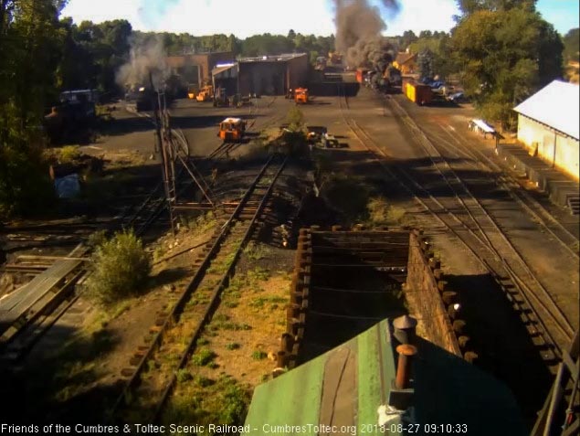 2018-08-27 The 483 comes out of south yard with an extra coach.jpg