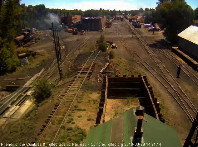 8-08-29 The 489 has moved the 2 display cars back to their spot on the depot track.jpg