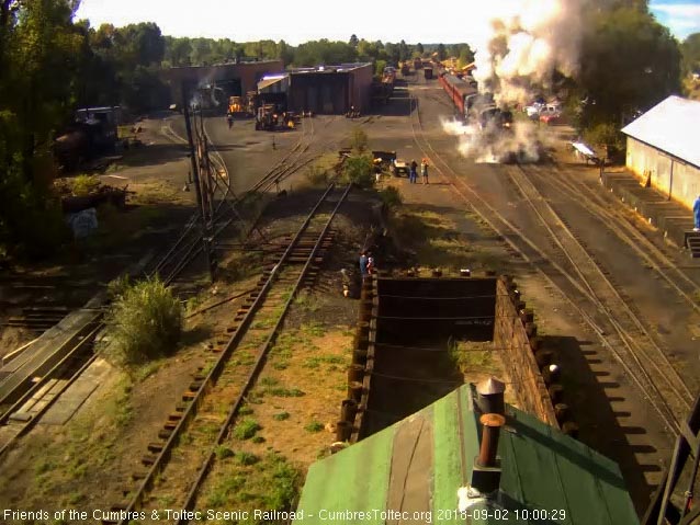 2018-09-02 The locomotives are enveloped in steam on this cool morning as the train gets underway.jpg