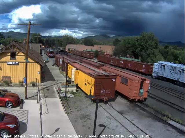 2018-09-02 Shoves back past the depot, to , I would guess, pick up the open gon and caboose that are there.jpg