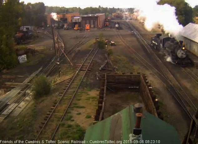 2018-09-06 The 484 pulls by the woodshop as it heads to the coal dock.jpg
