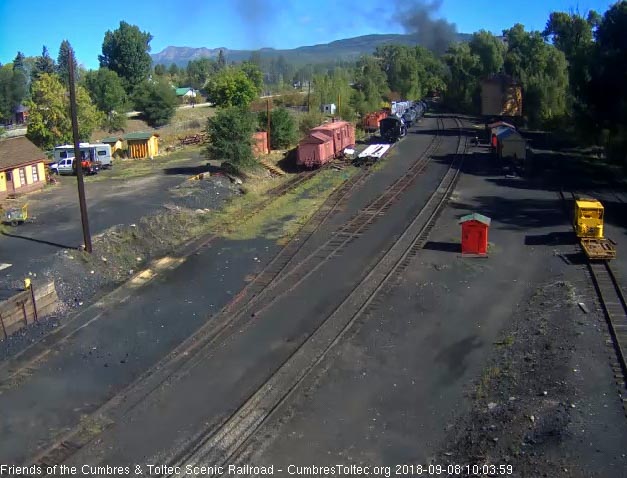 2018-09-08 The last cars are headed into the curve as the train turns east.jpg