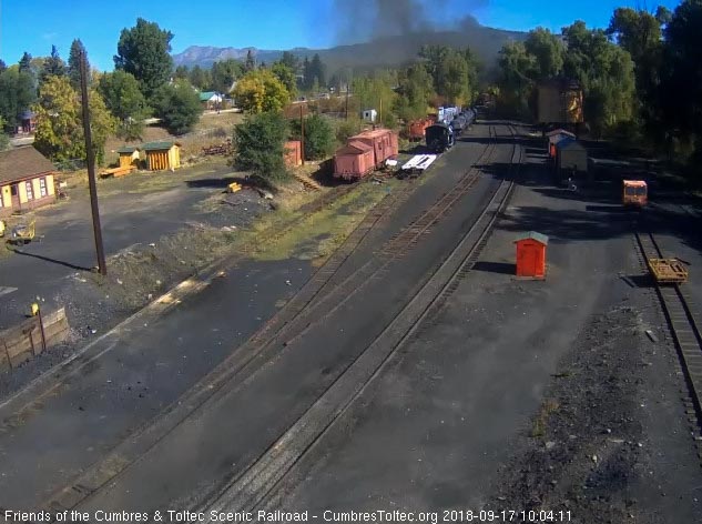 2018-09-17 The last cars of the train are rounding the curve as they turn east.jpg