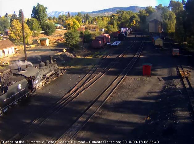 2018-09-18 The hostlers are loading coal into the 463's bunker as the 489 is now at the tank.jpg