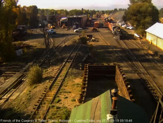 2018-09-19 The 487 comes out of south yard with a string of freight cars.jpg