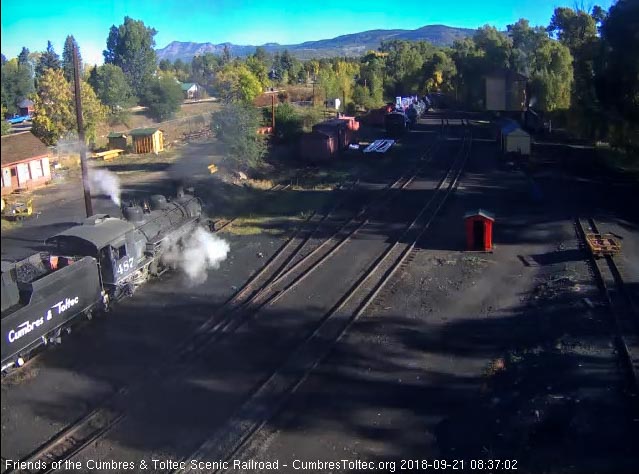 2018-09-21 The 487 has arrived at the coal dock as 489 takes water at the tank.jpg