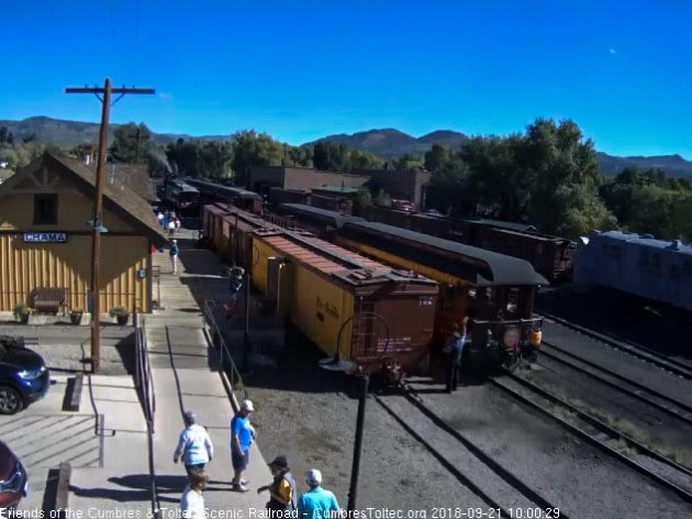 2018-09-21 With raised arm the conductor gives the high ball for train 216.jpg