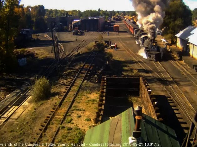 2018-09-21 With nice smoke from both locomotives, the train comes by the woodshop.jpg