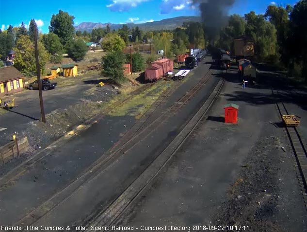 2018-09-22 The parlor is by the tank as the head end of the train disappears around the curve.jpg