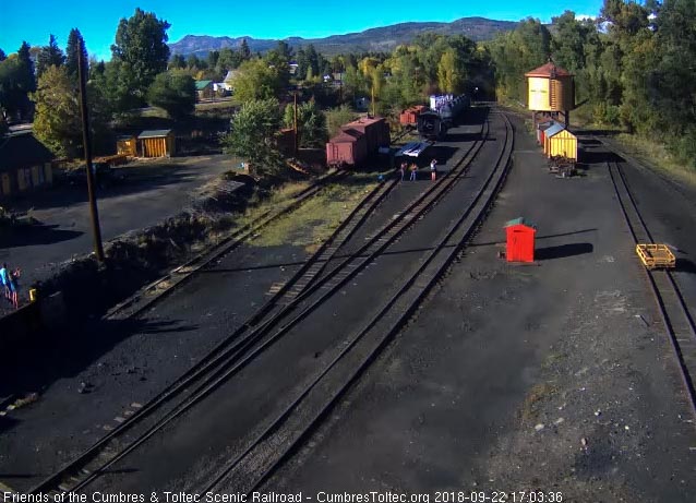 2018-09-22 The headlight of 487 shines from the shadows as it brings a 13 car train 215 into Chama.jpg