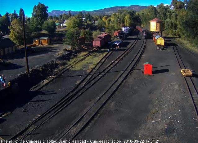 2018-09-22 The 487 is up to the tank as the last of the train is still in shadow.jpg