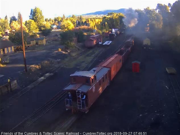 2018-09-27 The caboose is past the tipple as we see the conductor and trainman on the rear platform.jpg