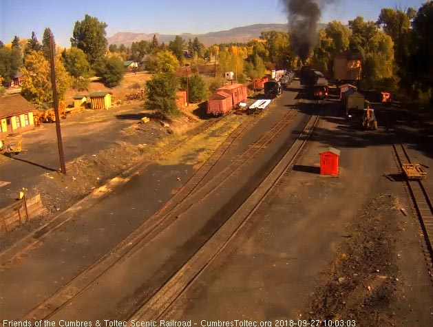 2018-09-27 The 487 is at the north end of the yard as the parlor passes the tank.jpg