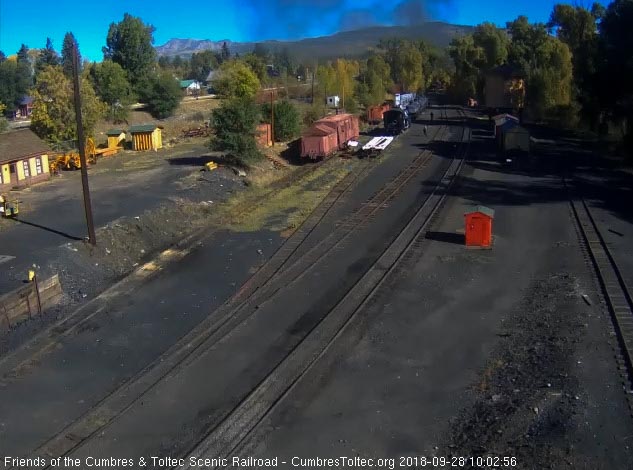 2018-09-28 The last cars are headed into the curve as the train turns east.jpg