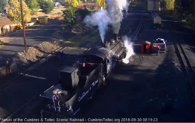 2018-09-30 The hostlers are backing the 487 toward the coal dock while Avery is getting the empty gas cans.jpg