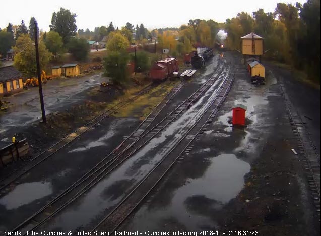 2018-10-02 The 489 brings a 9 car train 215 into a rainy Chama yard.jpg