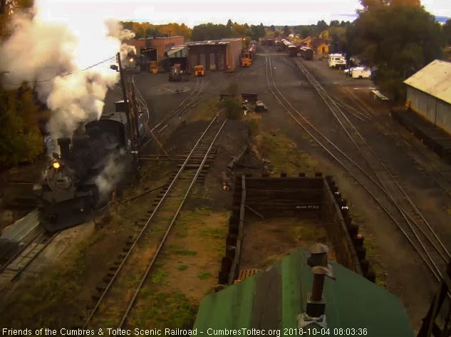 2018-10-03 The 489 moves over the pit as the headlight of another locomotive shines by the house.jpg