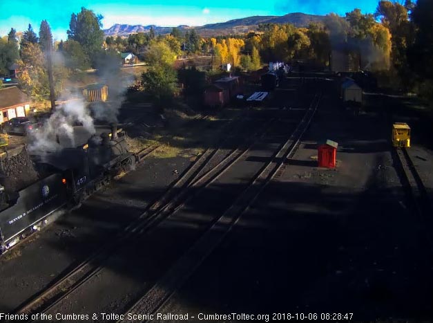 2018-10-06 The 463 ihas coal added to its bunker as one of the hostlers checks the fire.jpg