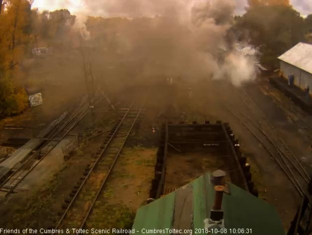 2018-10-08 The 488 is enveloped in steam as it works to get the 10 car train moving.jpg