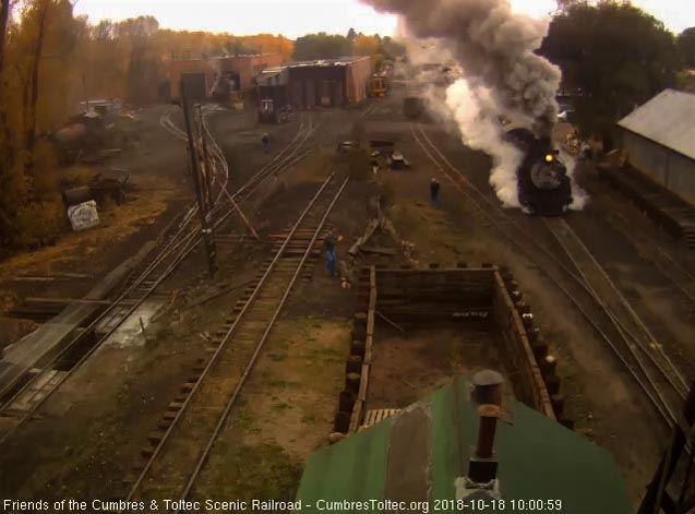 2018-10-18 After a brief stop, the locomotives again dig in to get the train moving.jpg