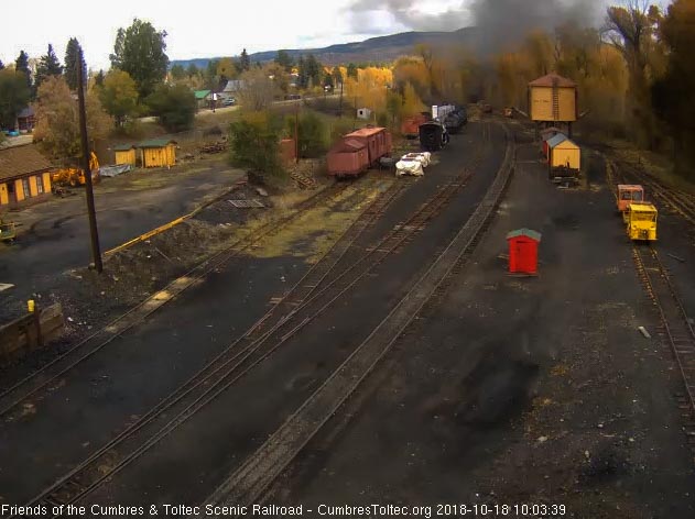 2018-10-18 The hanging smoke makes it hard to see, but the last cars are about to disappear around the curve.jpg