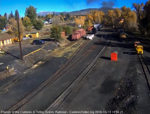 2018-10-19 The last cars on the train round the curve as the speeders move to follow.jpg