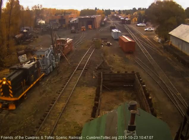 2018-10-23 Now couples to and shoves the spreader and a caboose toward south yard.jpg