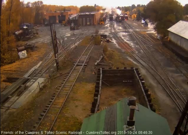 2018-10-24 The 487 is now pulling the hopper toward the south end of the yard, probably to get them filled with ballast.jpg