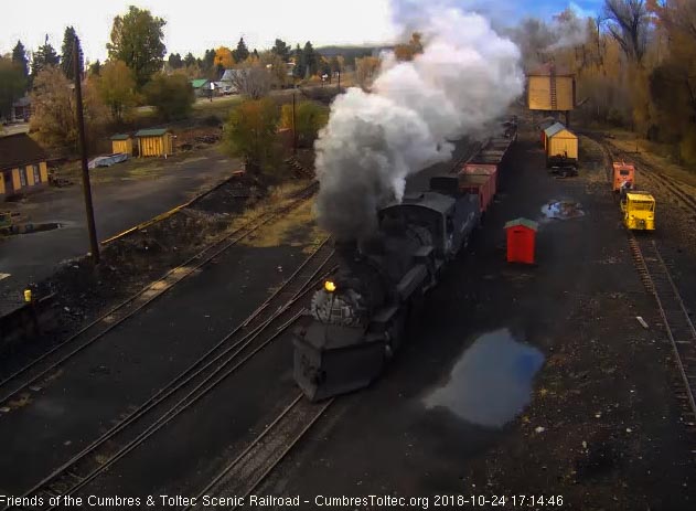 2018-10-24 Approaching the tipple we see 3 hoppers, a rider gon and caboose.jpg