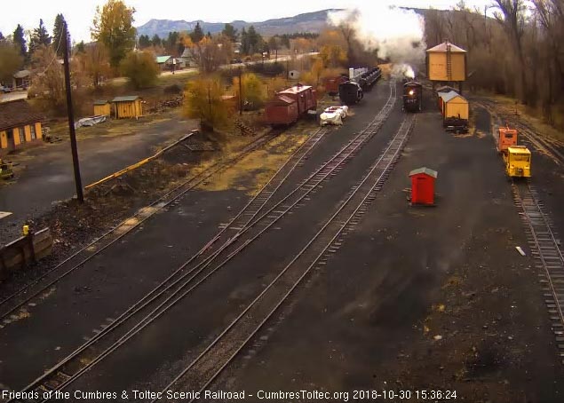 2018-10-30 Passing the tank as it heads to park its train.jpg