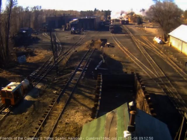 2018-11-06 After filling the hoppers, the train heads out on its first run of the day.jpg