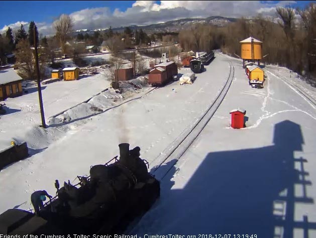 2018-12-07 As the 487 sits there, one of the shop crew has climbed on the top with a pipe wrench.jpg