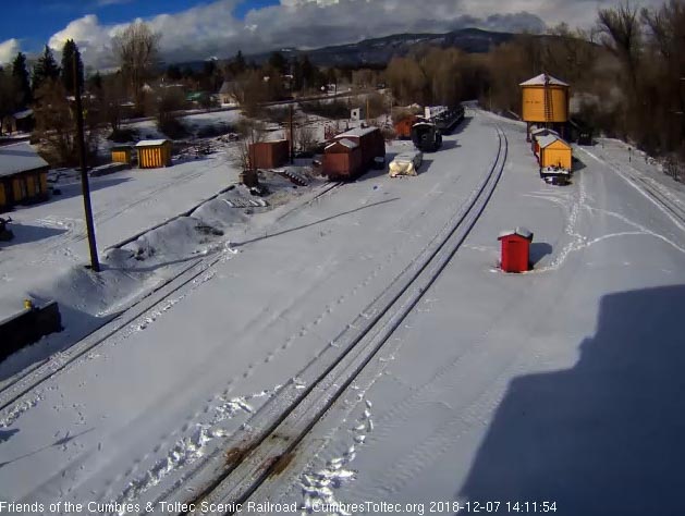 2018-12-07 The 487 stops at the tank to fill its cistern before heading to the house for the night.jpg