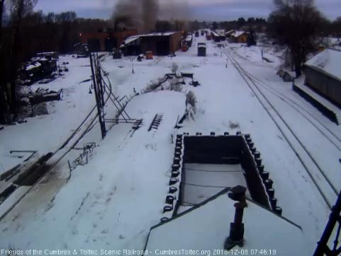 2018-12-08 Smoke pours from the west stall jack as the hostlers get the 487 ready.jpg