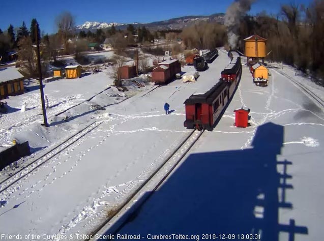 2018-12-09 The early winter sun is bright on the train as it passes north yard.jpg