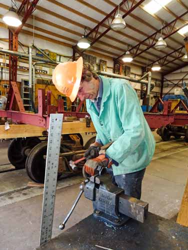 2019.07.29 With the drop bottom gon behind, a Friend does some work at the bench (1 of 1).jpg