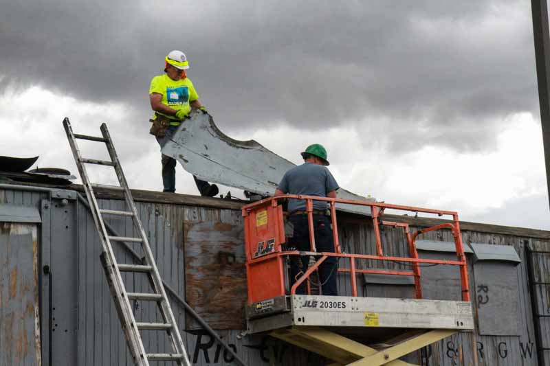 2019.08.01 Pulling the metal off the roof of OY itself (1 of 1).jpg