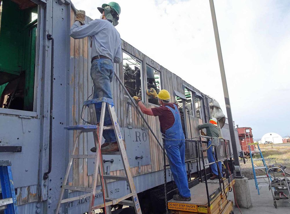 2019.09.15 Sanding the sides of the OY as the crew gets it ready for painting (1 of 1).jpg