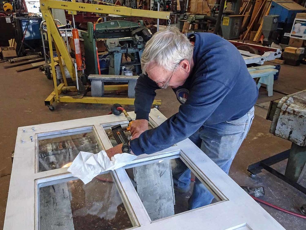 2019.09.25 da Using a nail gun to work on one of the OY doors (1 of 1).jpg