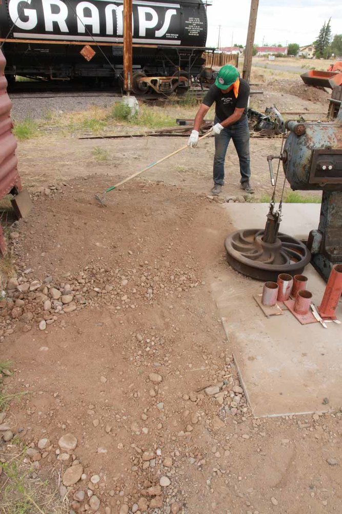 Work on cleaning up the ground around the wheel press (1 of 1).jpg