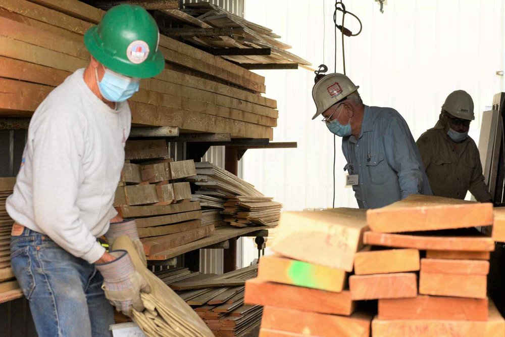 Working inside the storage container where the lumber is kept (1 of 1).jpg