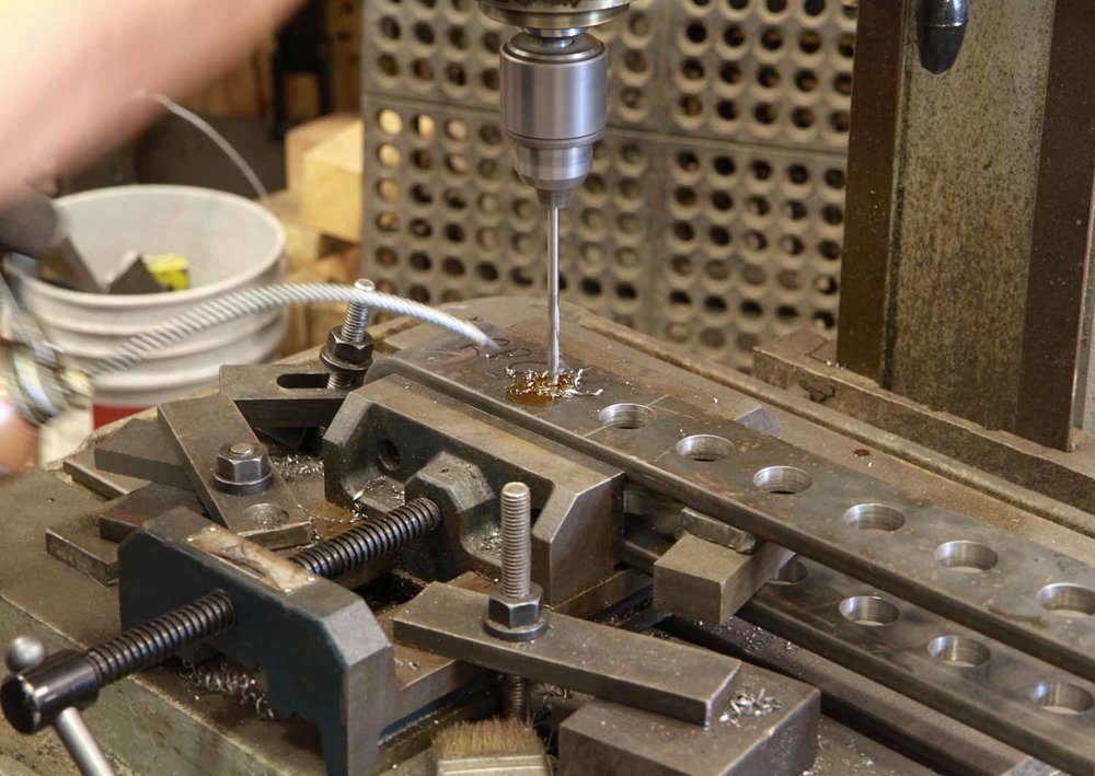 Close up of his work drill what looks like a pilot hole for a larger drill bit (1 of 1).jpg